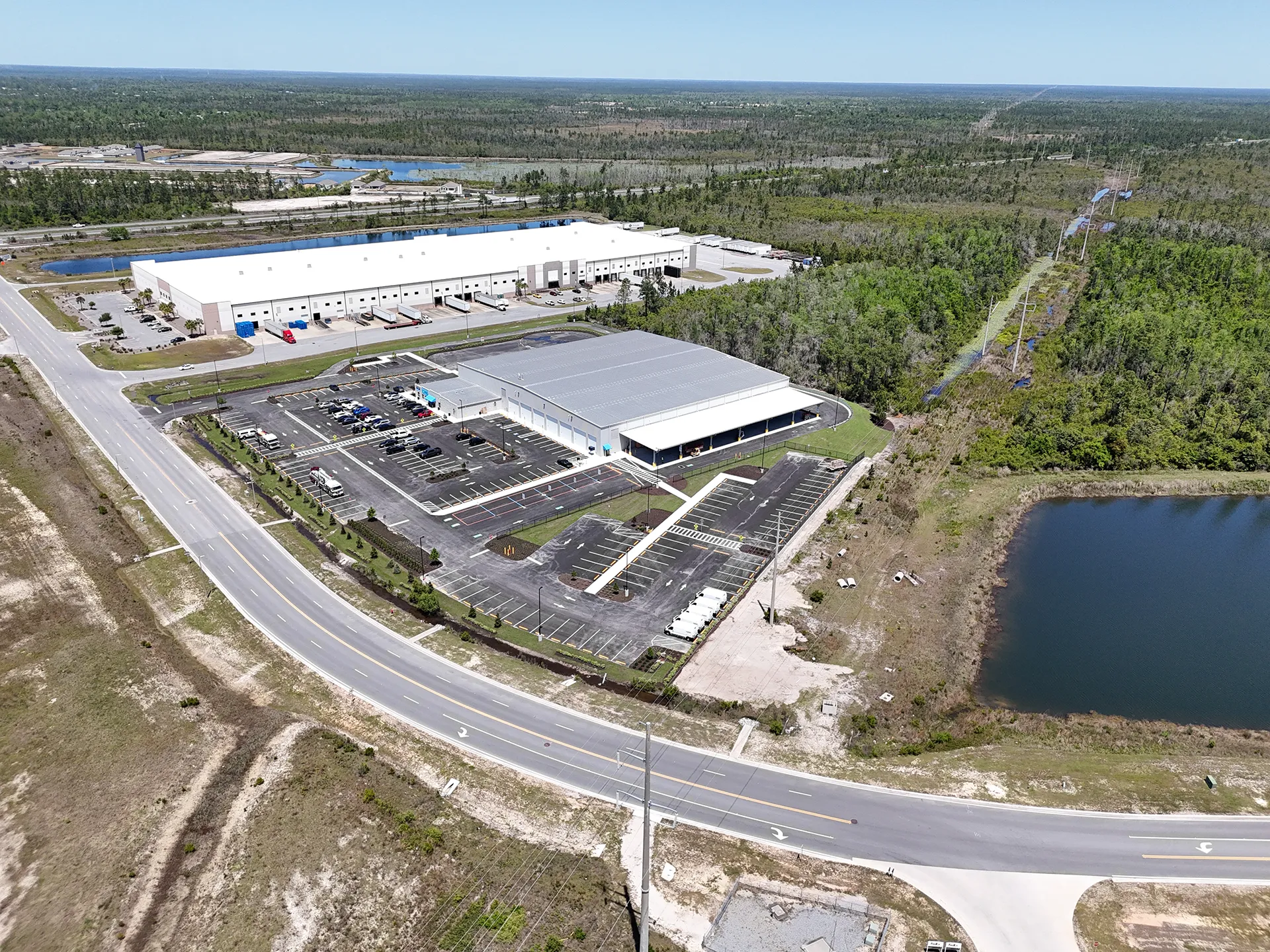 Aerial view of commercial buildings and surrounding roads